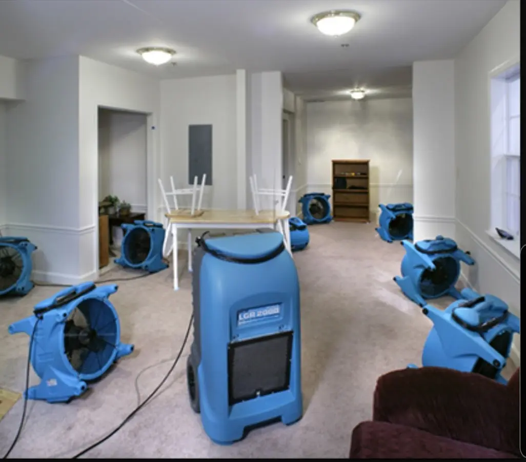 Air movers and dehumidifier setup for Water Damage Restoration in Charlotte